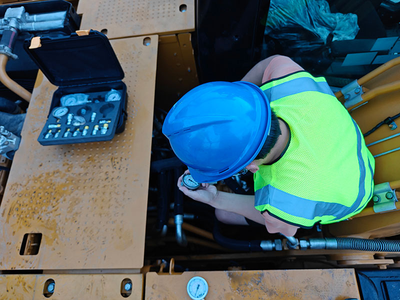 Engineers inspect the sub-rotation device